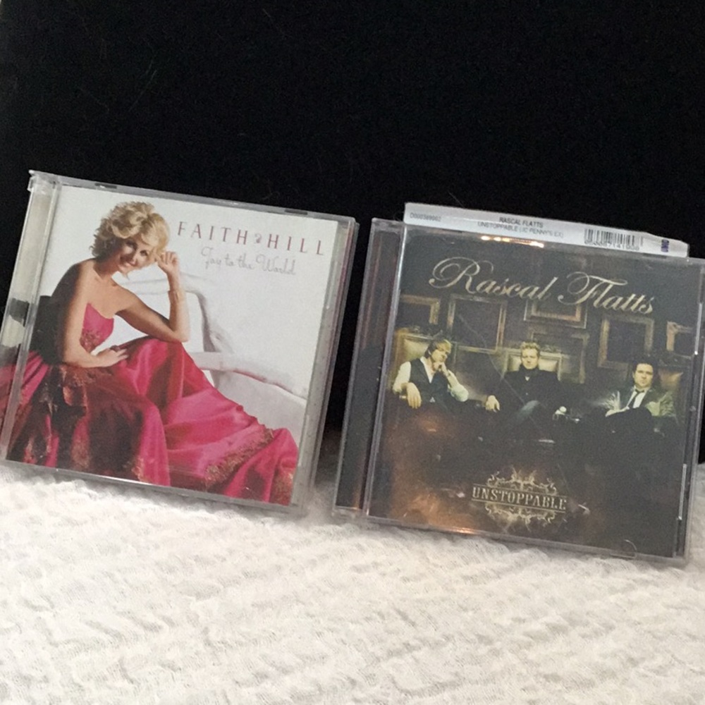 Faith Hill Jow to the World and Rascal Flatts Unstoppable CD’s
